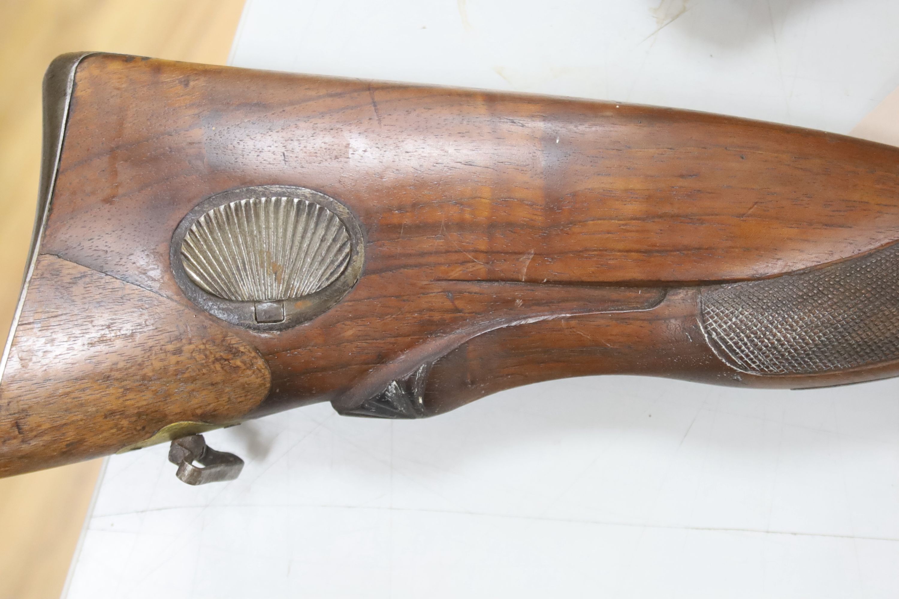 A 19th century percussion musket, barrel impressed Fabricado por Thomas Beristain Eibar, 1864, walnut stock with ramrod, 126cm